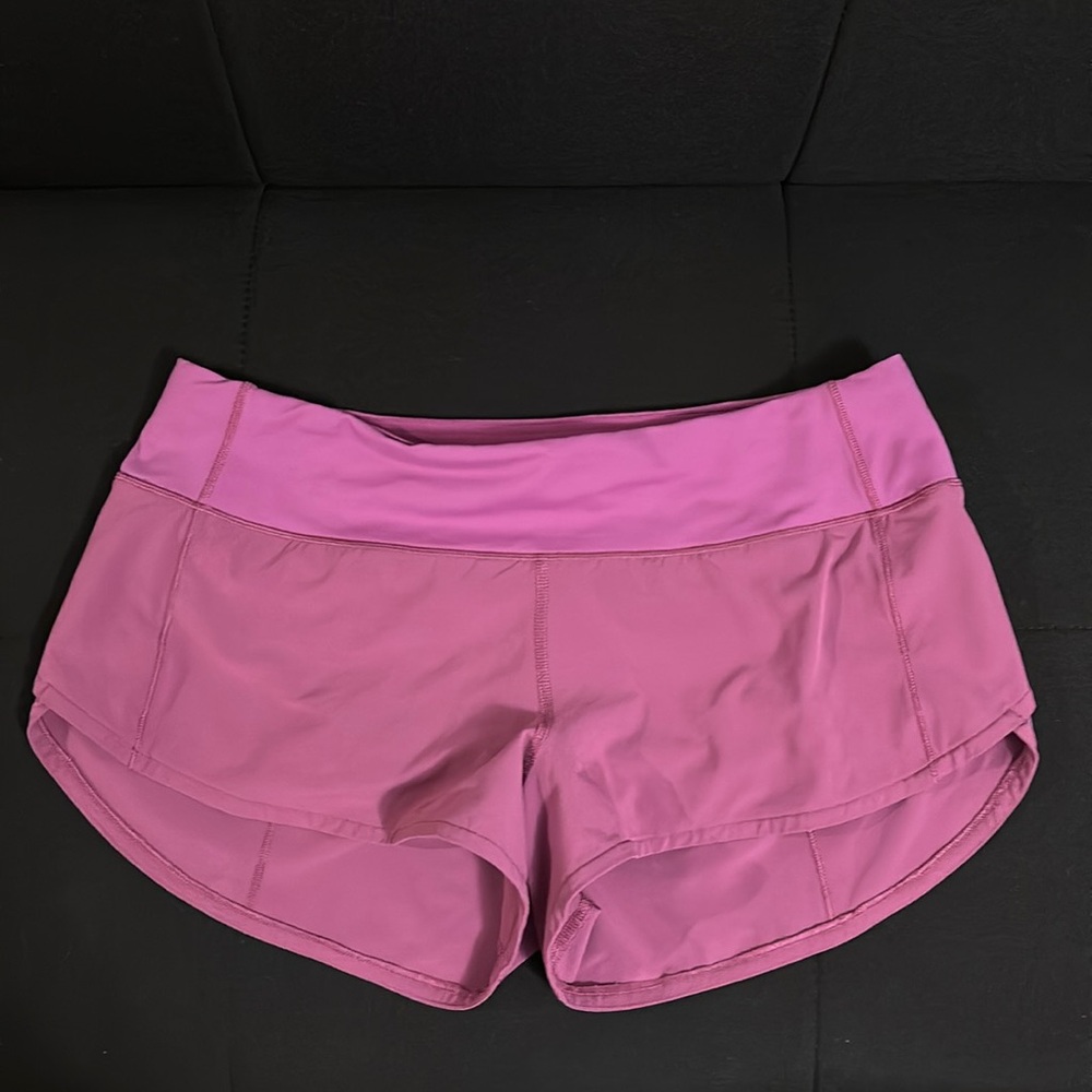 Lululemon 2.5” low rise speed up vivid plum shorts; size 6